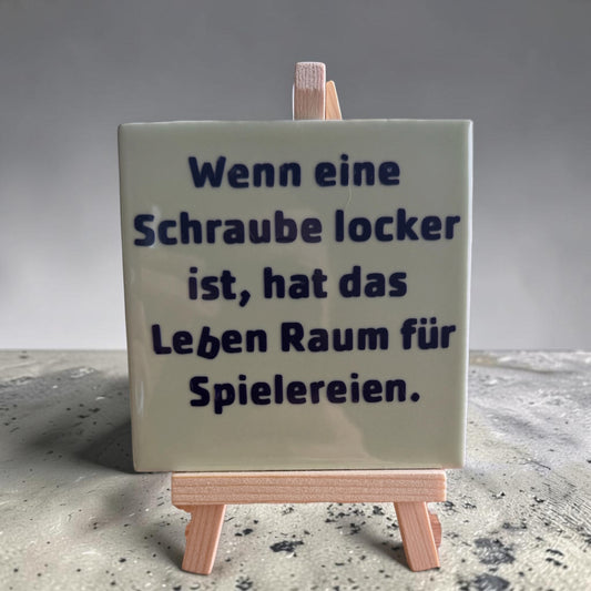 Spruch-Kachel – „ Wenn eine Schraube locker ist , hat das Leben Raum für Spielereinen“